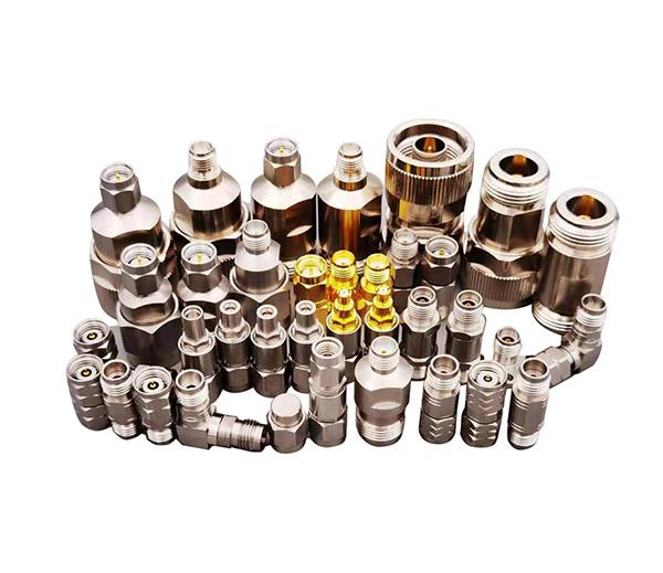 Precision RF Connectors including SMA series (3.5, 2.92, 2.4, 2.85) and adapter samples like IPEX5-SMA on a measurement display